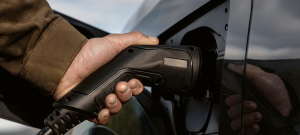 tight shot of plugging in charger into phev